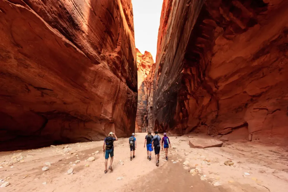 group of people in slot canyon
